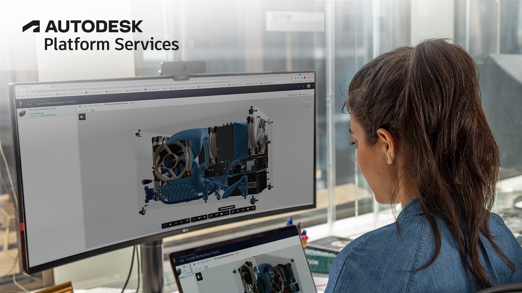 Designer reviewing 3D model on APS with dual monitors